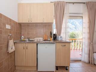 Апартаменты Beautiful modern apartment 150m from the sea Котор Апартаменты с 1 спальней-12