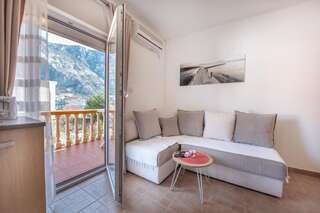 Апартаменты Beautiful modern apartment 150m from the sea Котор Апартаменты с 1 спальней-30